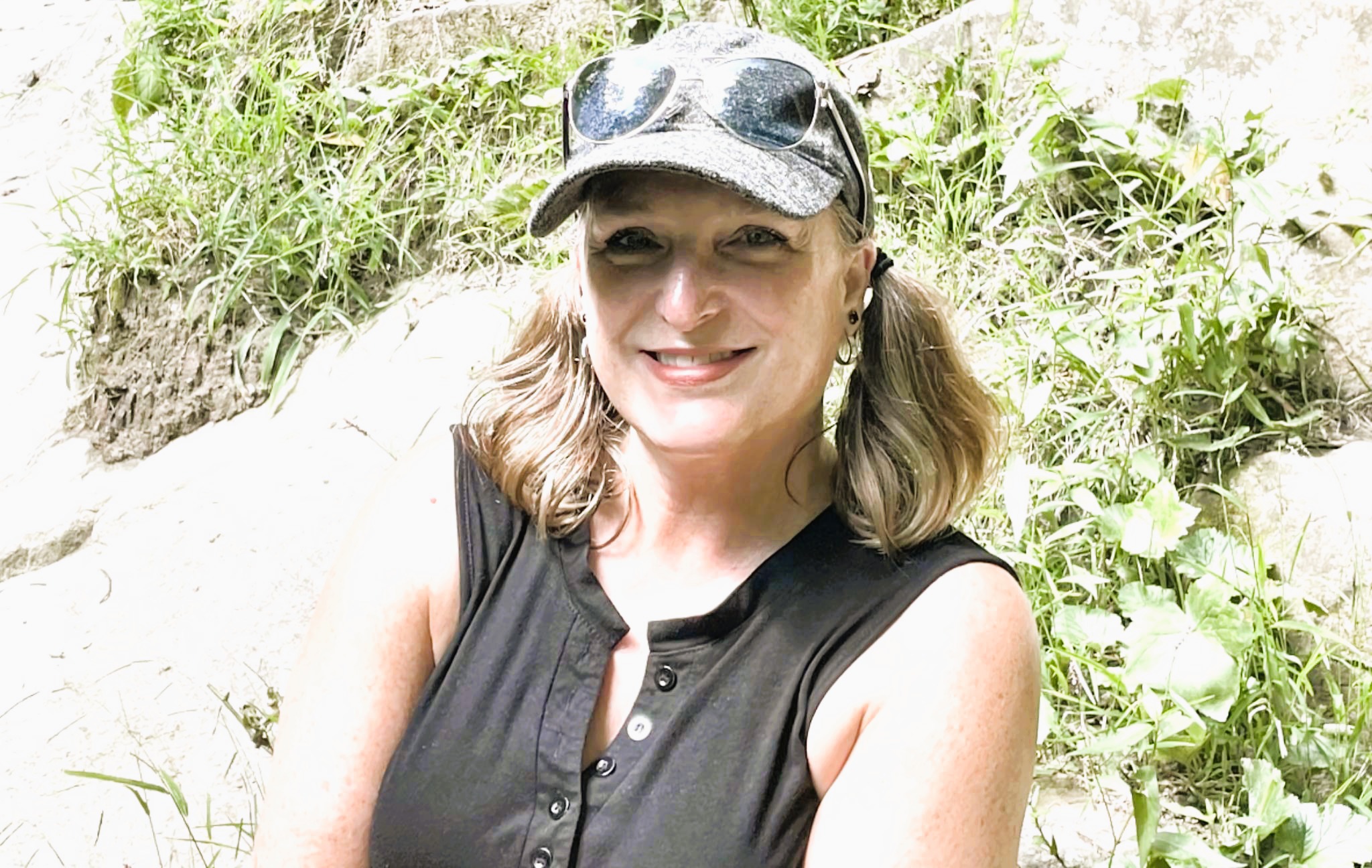 Janet Cooper Haas, Clinical EFT Practitioner in Charlotte, NC, smiling for Rising Feminine EFT